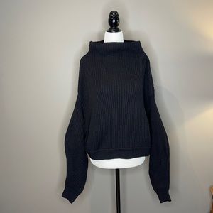Black Free People sweater. Brand new. Never worn.